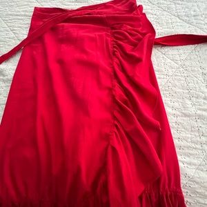 Women’s one-size-fits-all, new, wrap skirt. Super adorable! Never worn.